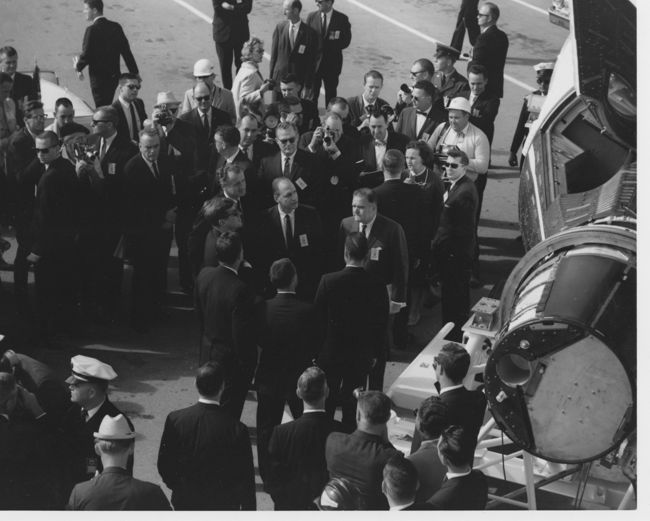 President Kennedy views Gemini I Capsule